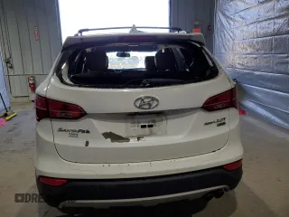 2013 Hyundai Santa Fe Sport z VIN 5XYZUDLAXDG118080, wystawiony jako Copart lot #54294665 z przebiegiem 142 809 mil mil oraz Szkoda całkowita • Salvage title. Historia ofert i sprzedaży dostępna na DreamBid. Obrazek 6.