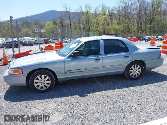 2007 Ford Crown Victoria LX z VIN 2FAFP74V37X122518, wystawiony jako IAAI lot #42071004 z przebiegiem 228 547 mil mil oraz . Historia ofert i sprzedaży dostępna na DreamBid. Obrazek 14.