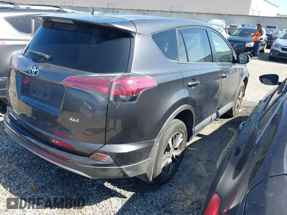 2018 Toyota RAV4 XLE with VIN JTMWFREV6JJ175575, listed as a IAAI auction lot 41788004 with 112,577 mi miles. Bid and sale history available at carsss.com. Image 4.