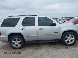 2011 Chevrolet Tahoe LT with VIN 1GNSCBE05BR190310, listed as a IAAI auction lot 42243623 with 249,453 mi miles and . Bid and sale history available at DreamBid. Image 13.