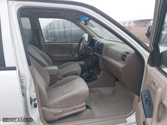 2001 Isuzu Rodeo S with VIN 4S2DM58WX14315138, listed as a IAAI auction lot 41535619 with 217,960 mi miles. Bid and sale history available at carsss.com. Image 5.