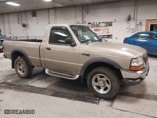 1999 Ford Ranger XLT with VIN 1FTYR11X0XTA72917, listed as a IAAI auction lot 41502156 with 106,585 mi miles. Bid and sale history available at carsss.com. Image 14.