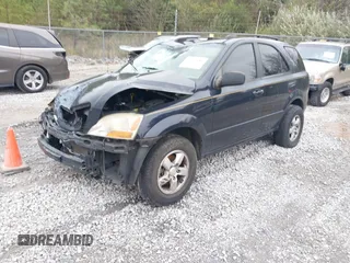 2009 Kia Sorento LX with VIN KNDJD735295866128, listed as a IAAI auction lot 40965680 with 164,784 mi miles and . Bid and sale history available at DreamBid. Image 2.