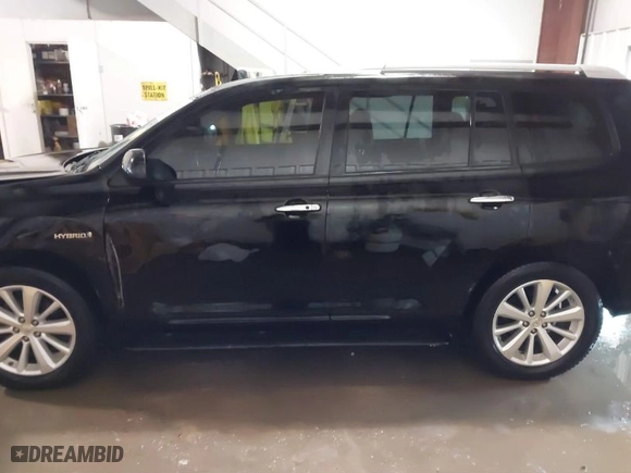 2009 Toyota Highlander Hybrid Limited with VIN JTEEW44A192035643, listed as a IAAI auction lot 41330015 with 200,839 mi miles. Bid and sale history available at carsss.com. Image 15.