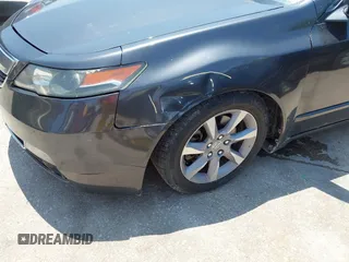 2012 Acura TL Auto z VIN 19UUA8F20CA005804, wystawiony jako IAAI lot #42505265 z przebiegiem 178 359 mil mil oraz . Historia ofert i sprzedaży dostępna na DreamBid. Obrazek 6.