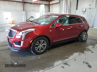 2023 Cadillac XT5 AWD Premium Luxury with VIN 1GYKNDR45PZ161788, listed as a Copart auction lot 53437445 with 25,276 mi miles and Salvage title. Bid and sale history available at DreamBid. Image 1.