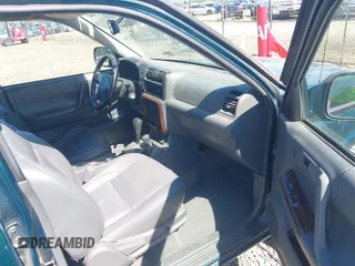1998 Honda Passport LX z VIN 4S6CM58W0W4407344, wystawiony jako IAAI lot #42201105 z przebiegiem 254 317 mil mil oraz . Historia ofert i sprzedaży dostępna na DreamBid. Obrazek 5.