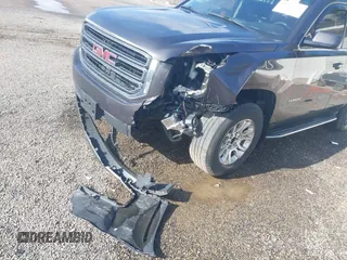 2016 GMC Yukon SLE with VIN 1GKS2AKC9GR273724, listed as a IAAI auction lot 41945761 with 141,425 mi miles. Bid and sale history available at carsss.com. Image 6.