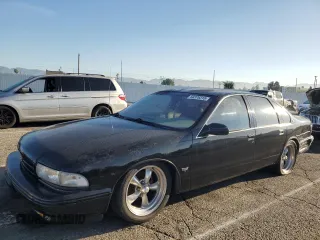 1995 Chevrolet Caprice with VIN 1G1BL52P5SR174158, listed as a Copart auction lot 50378315 with 220,515 mi miles and Salvage Title. Bid and sale history available at DreamBid. Image 1.