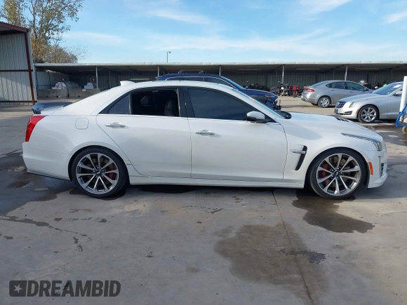 2017 Cadillac CTS-V z VIN 1G6A15S64H0137358, wystawiony jako IAAI lot #41336455 z przebiegiem 76 367 mil mil oraz . Historia ofert i sprzedaży dostępna na DreamBid. Obrazek 13.