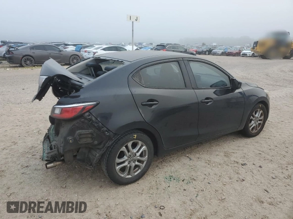 2016 Scion iA z VIN 3MYDLBZV8GY100948, wystawiony jako Copart lot #53285015 z przebiegiem 192 027 mil mil oraz Szkoda całkowita • Salvage title. Historia ofert i sprzedaży dostępna na DreamBid. Obrazek 3.