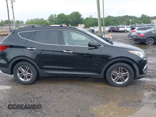 2017 Hyundai Santa Fe 2.4L z VIN 5NMZU3LB3HH011127, wystawiony jako IAAI lot #42369671 z przebiegiem 91 634 mil mil oraz . Historia ofert i sprzedaży dostępna na DreamBid. Obrazek 13.