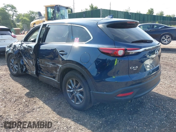 2021 Mazda CX-9 Touring with VIN JM3TCBCY7M0507699, listed as a IAAI auction lot 42603614 with 62,635 mi miles and . Bid and sale history available at DreamBid. Image 3.