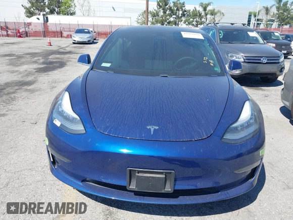 2020 Tesla Model 3 Standard Range Plus with VIN 5YJ3E1EA1LF590396, listed as a IAAI auction lot 41868089 with 51,278 mi miles. Bid and sale history available at carsss.com. Image 12.