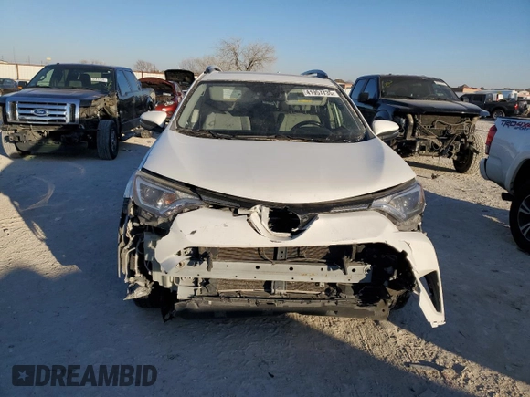 2018 Toyota RAV4 XLE with VIN JTMWFREV7JJ742974, listed as a Copart auction lot 41957735 with 87,005 mi miles and Salvage Title. Bid and sale history available at DreamBid. Image 5.