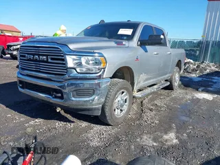2020 Ram 2500 Big Horn with VIN 3C6UR5DL0LG155793, listed as a IAAI auction lot 41409151 with 70,466 mi miles and . Bid and sale history available at DreamBid. Image 2.