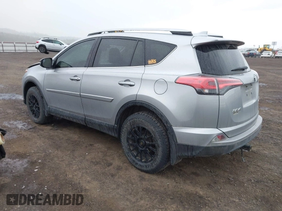 2018 Toyota RAV4 LE with VIN 2T3BFREV9JW724606, listed as a IAAI auction lot 41862028 with 98,590 mi miles. Bid and sale history available at carsss.com. Image 3.