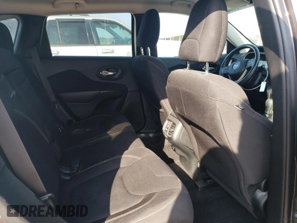2016 Jeep Cherokee Latitude with VIN 1C4PJLCS7GW135851, listed as a Copart auction lot 64583265 with 147,191 mi miles and Salvage title. Bid and sale history available at DreamBid. Image 11.