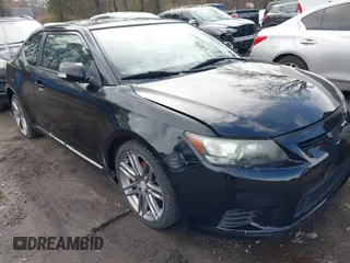 2011 Scion tC with VIN JTKJF5C74B3014552, listed as a IAAI auction lot 42004369 with 232,588 mi miles. Bid and sale history available at carsss.com. Image 6.