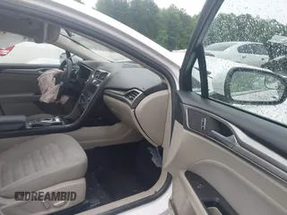 2018 Ford Fusion SE z VIN 3FA6P0H75JR159448, wystawiony jako IAAI lot #42262839 z przebiegiem 144 353 mil mil oraz . Historia ofert i sprzedaży dostępna na DreamBid. Obrazek 5.