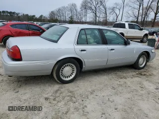 2000 Mercury Grand Marquis LS z VIN 2MEFM75W4YX722958, wystawiony jako Copart lot #47927745 z przebiegiem 148 461 mil mil oraz Szkoda całkowita • Salvage title. Historia ofert i sprzedaży dostępna na DreamBid. Obrazek 3.