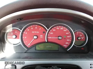 2006 Pontiac GTO z VIN 6G2VX12U46L833662, wystawiony jako Copart lot #48145245 z przebiegiem 66 828 mil mil oraz Tytuł czysty. Historia ofert i sprzedaży dostępna na DreamBid. Obrazek 9.