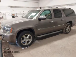 2012 Chevrolet Suburban LTZ with VIN 1GNSKKE79CR180400, listed as a IAAI auction lot 41807195 with 154,410 mi miles and . Bid and sale history available at carsss.com. Image 17.