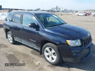 2011 Jeep Compass with VIN 1J4NT1FA7BD208658, listed as a IAAI auction lot 41795085 with 198,880 mi miles. Bid and sale history available at carsss.com. Image 1.