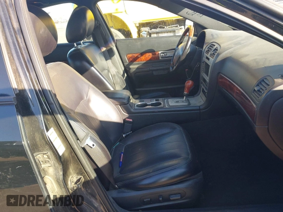 2003 Lincoln LS Sport z VIN 1LNHM87A33Y689084, wystawiony jako IAAI lot #41023405 z przebiegiem 205 200 mil mil oraz . Historia ofert i sprzedaży dostępna na DreamBid. Obrazek 5.