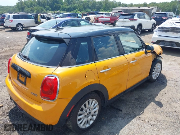 2016 MINI Hardtop 4 Door z VIN WMWXU1C53G2D08424, wystawiony jako IAAI lot #42509304 z przebiegiem 97 729 mil mil oraz . Historia ofert i sprzedaży dostępna na DreamBid. Obrazek 4.