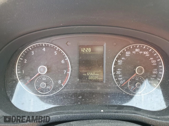 2013 Volkswagen Passat Wolfsburg Edition z VIN 1VWAH7A31DC027577, wystawiony jako Copart lot #54858125 z przebiegiem 88 685 mil mil oraz Szkoda całkowita • Salvage title. Historia ofert i sprzedaży dostępna na DreamBid. Obrazek 9.