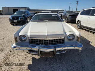 1974 Chevrolet Monte Carlo z VIN 1H57H4R75663, wystawiony jako Copart lot #81492924 z przebiegiem 90 431 mil mil oraz Tytuł czysty. Historia ofert i sprzedaży dostępna na DreamBid. Obrazek 5.