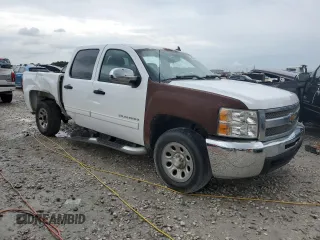 2013 Chevrolet Silverado 1500 LT with VIN 3GCPCSEA8DG237890, listed as a Copart auction lot 64668184 with 196,804 mi miles and Salvage Title. Bid and sale history available at DreamBid. Image 4.