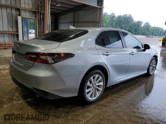 2023 Toyota Camry LE z VIN 4T1C11AK6PU082458, wystawiony jako Copart lot #56209395 z przebiegiem 38 806 mil mil oraz Szkoda całkowita • Salvage title. Historia ofert i sprzedaży dostępna na DreamBid. Obrazek 3.