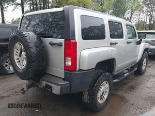2006 Hummer H3 with VIN 5GTDN136168189138, listed as a IAAI auction lot 42012951 with 209,548 mi miles. Bid and sale history available at carsss.com. Image 4.