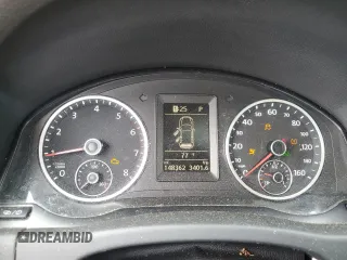 2013 Volkswagen Tiguan SE z VIN WVGBV7AX0DW539618, wystawiony jako Copart lot #71529804 z przebiegiem 148 362 mil mil oraz Szkoda całkowita • Salvage title. Historia ofert i sprzedaży dostępna na DreamBid. Obrazek 9.