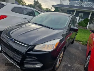 2013 Ford Escape SE with VIN 1FMCU0GX6DUD82131, listed as a Copart auction lot 75404224 with 154,216 mi miles and Clean Title. Bid and sale history available at carsss.com. Image 2.