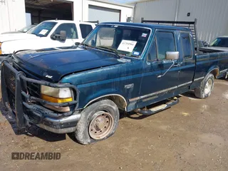 1995 Ford F-150 with VIN 1FTEX15N4SKC22219, listed as a IAAI auction lot 41704904 with 267,405 mi miles. Bid and sale history available at carsss.com. Image 2.