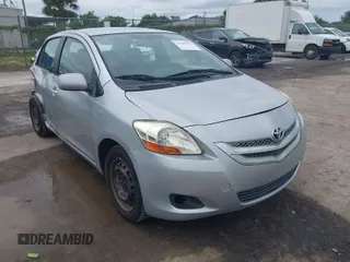 2007 Toyota Yaris with VIN JTDBT903X71107205, listed as a IAAI auction lot 41985354 with 200,887 mi miles. Bid and sale history available at carsss.com. Image 1.
