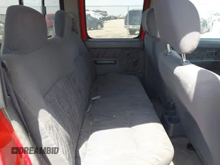 2000 Nissan Frontier XE z VIN 1N6ED27T5YC355209, wystawiony jako IAAI lot #42397674 z przebiegiem 198 278 mil mil oraz . Historia ofert i sprzedaży dostępna na DreamBid. Obrazek 8.