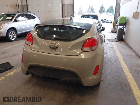 2013 Hyundai Veloster w/Black Int with VIN KMHTC6AD2DU128534, listed as a IAAI auction lot 41791398 with 158,414 mi miles and . Bid and sale history available at DreamBid. Image 16.