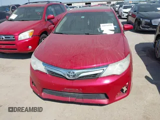 2014 Toyota Camry SE with VIN 4T1BK1FK8EU547143, listed as a IAAI auction lot 41876192 with 209,535 mi miles. Bid and sale history available at carsss.com. Image 6.