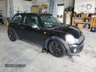 2012 MINI Hardtop with VIN WMWSU3C58CT369968, listed as a Copart auction lot 60102135 with 138,062 mi miles and Salvage title. Bid and sale history available at DreamBid. Image 4.