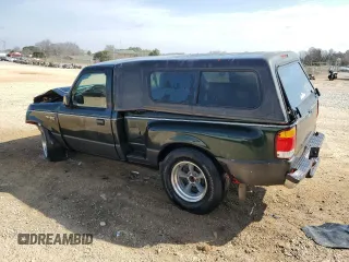 1997 Ford Ranger XLT with VIN 1FTCR10AXVPB26107, listed as a Copart auction lot 49113425 with 148,630 mi miles and Salvage Title. Bid and sale history available at DreamBid. Image 2.