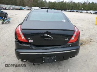 2015 Jaguar XJ with VIN SAJWA1CZ1F8V85402, listed as a Copart auction lot 86717734 with 201,249 mi miles and Salvage Title. Bid and sale history available at carsss.com. Image 6.