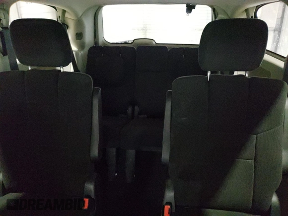 2014 Dodge Grand Caravan SXT z VIN 2C4RDGCGXER138025, wystawiony jako Copart lot #57941985 z przebiegiem 87 055 mil mil oraz Szkody całkowita. Historia ofert i sprzedaży dostępna na DreamBid. Obrazek 10.