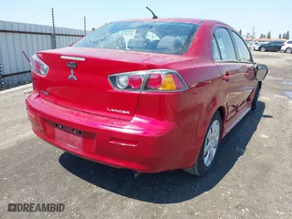 2015 Mitsubishi Lancer ES with VIN JA32U2FU9FU015485, listed as a IAAI auction lot 42015241 with 75,545 mi miles. Bid and sale history available at carsss.com. Image 4.