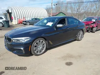 2018 BMW 5 Series M550i xDrive with VIN WBAJB9C52JB035930, listed as a IAAI auction lot 41674415 with 56,294 mi miles and . Bid and sale history available at DreamBid. Image 2.