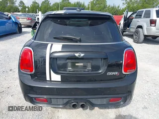 2016 MINI Hardtop 4 Door S z VIN WMWXU3C53G2D30807, wystawiony jako IAAI lot #42545577 z przebiegiem 86 952 mil mil oraz . Historia ofert i sprzedaży dostępna na DreamBid. Obrazek 16.