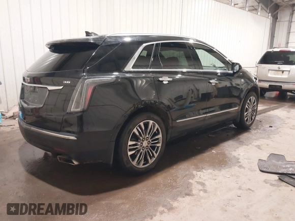 2019 Cadillac XT5 Premium Luxury AWD z VIN 1GYKNFRSXKZ189590, wystawiony jako IAAI lot #41316561 z przebiegiem 98 755 mil mil oraz . Historia ofert i sprzedaży dostępna na DreamBid. Obrazek 4.